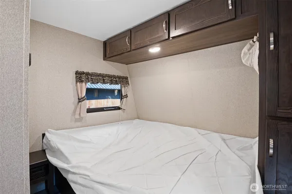 a view of a backyard with sitting area