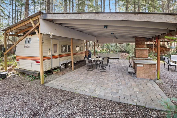 a kitchen with stainless steel appliances granite countertop a stove and a refrigerator