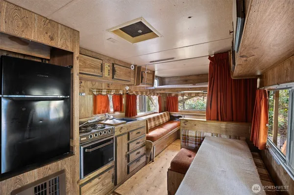 a view of kitchen and washer and dryer