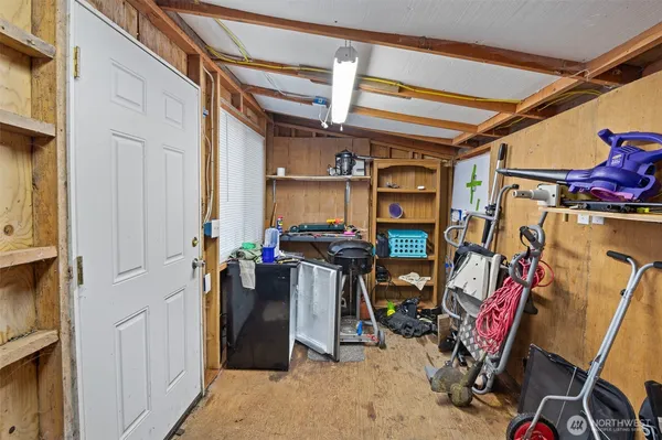 a view of a backyard with sitting area