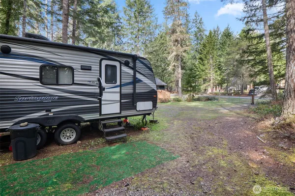 a view of a balcony and chairs