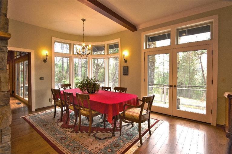 2459 Hugo Road Merlin, OR 97532 - Photo 8 of 37 a dining room with furniture window and wooden floor