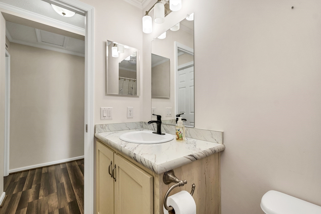 10 Ashleigh Lane, Unit 10 Rochester, NH 03867 - Photo 31 of 42 a bathroom with a sink and a mirror