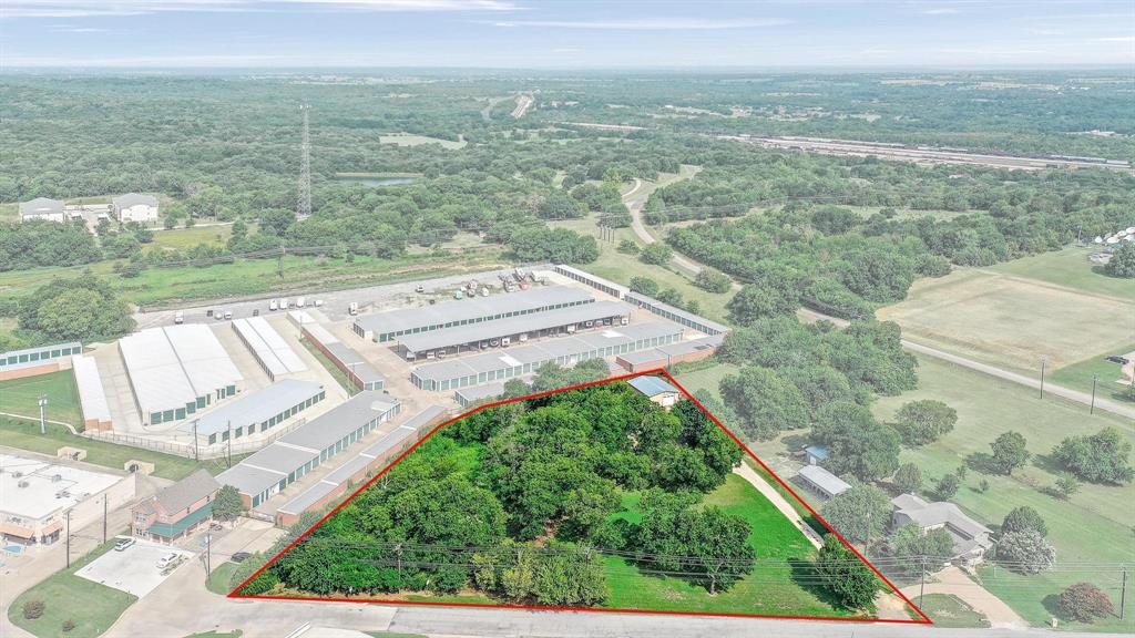 a view of a city from a yard