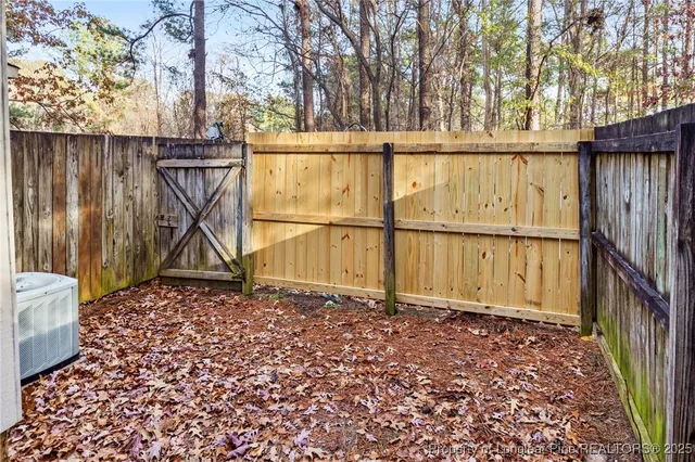 a view of a swimming pool with an outdoor seating