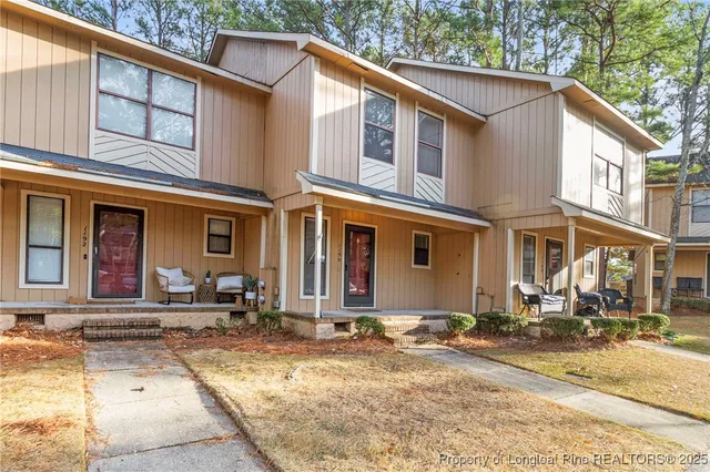 a view of backyard of the house