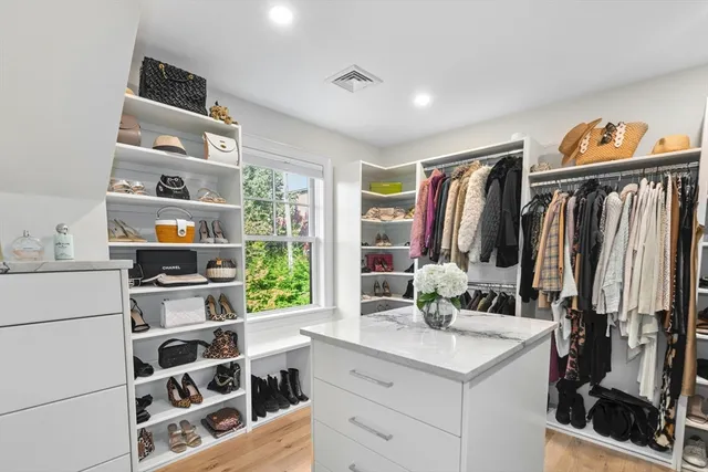 a kitchen with stainless steel appliances a stove and a sink
