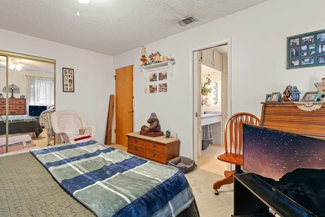 a bathroom with a toilet a sink and a shower