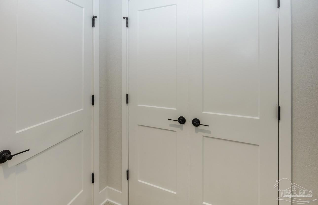 7657 Small Pnes Street Milton, FL 32583 - Photo 21 of 26 a bathroom with a shower