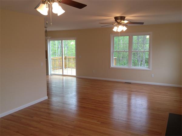 5 Birch Road Freetown, MA 02702 - Photo 12 of 25 a view of an empty room with wooden floor and a window