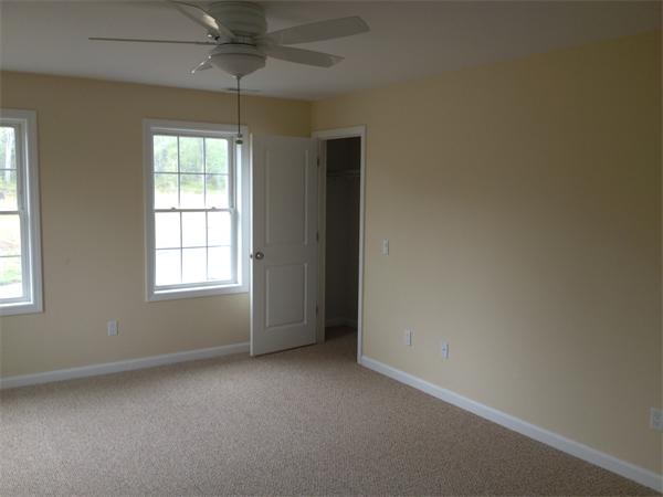 5 Birch Road Freetown, MA 02702 - Photo 19 of 25 an empty room with windows and fan