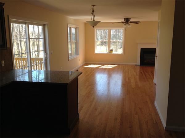 5 Birch Road Freetown, MA 02702 - Photo 3 of 25 a view of an empty room with wooden floor and a window