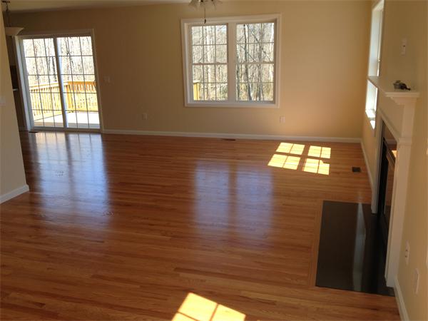 5 Birch Road Freetown, MA 02702 - Photo 4 of 25 an empty room with wooden floor and windows
