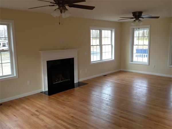 5 Birch Road Freetown, MA 02702 - Photo 5 of 25 a view of an empty room with a window and wooden floor