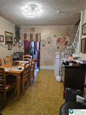 a view of a workspace with furniture