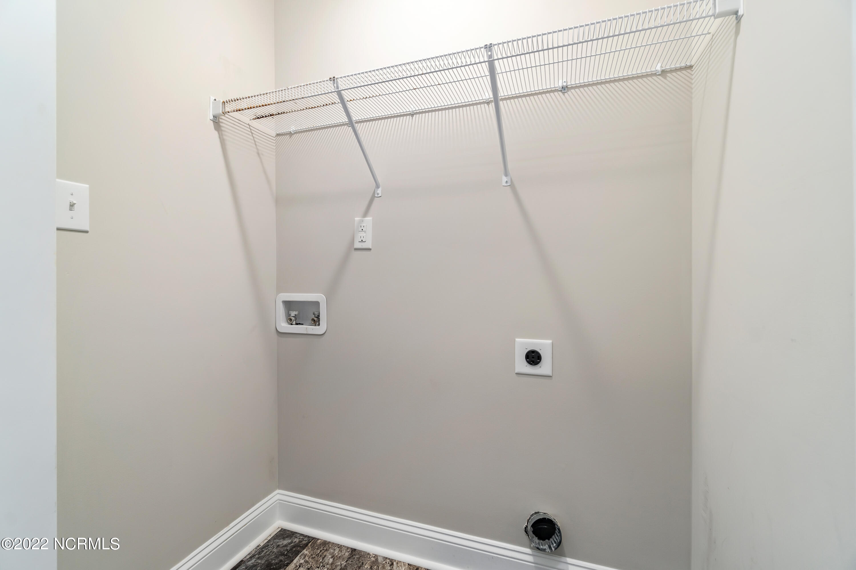 2800 West Fort Macon Road, Unit 48 Atlantic Beach, NC 28512 - Photo 27 of 45 Laundry Hall Closet View