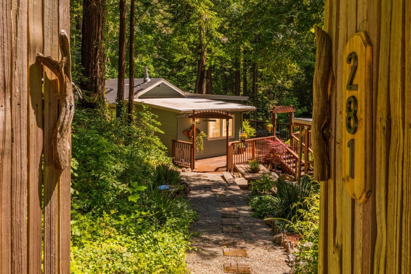 a view of a balcony with a table and chairs