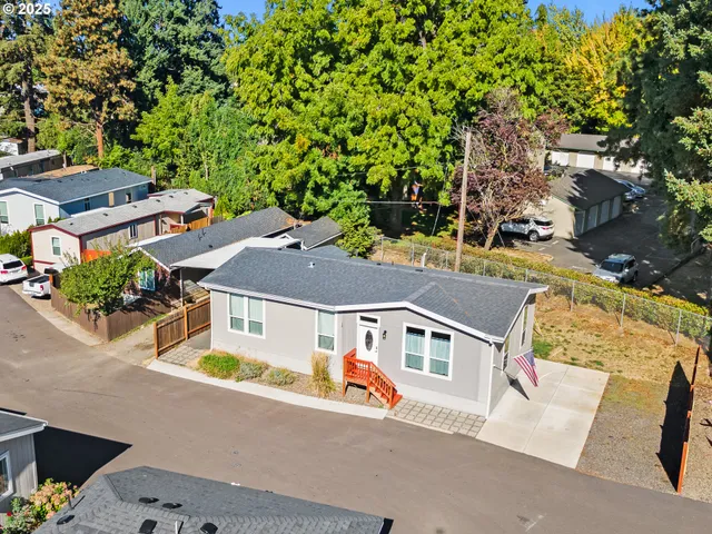 an aerial view of a house with swimming pool