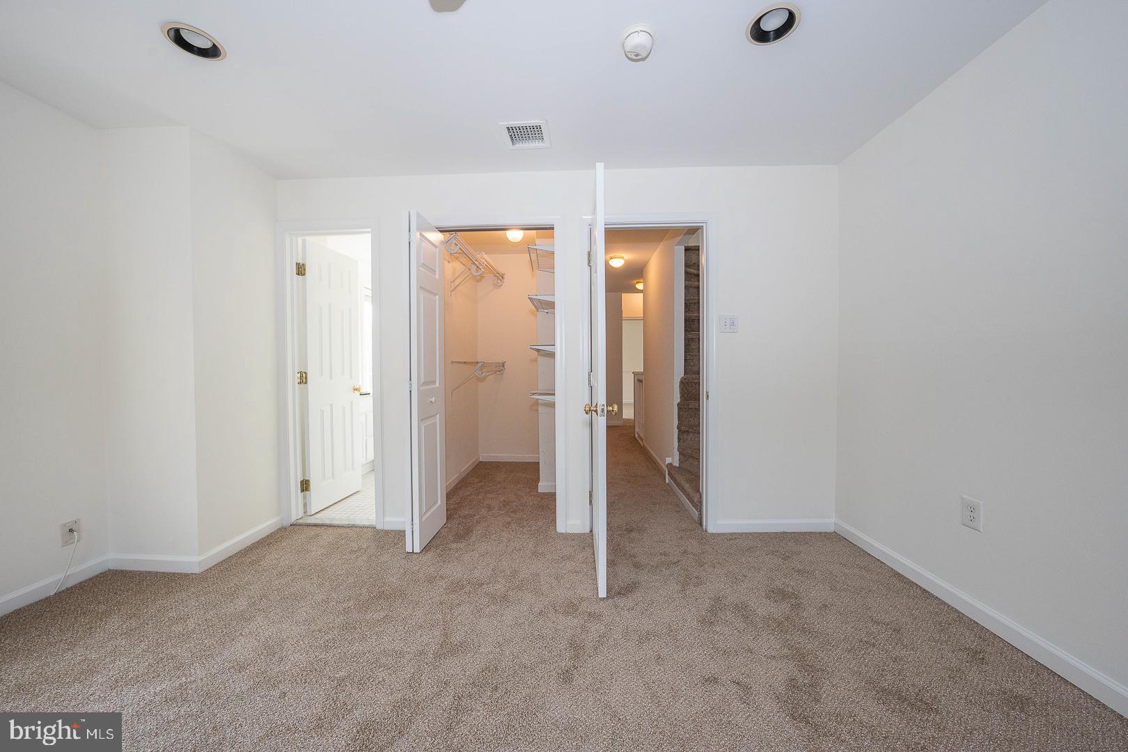 231 Plant Avenue Wayne, PA 19087 - Photo 12 of 35 an empty room with chandelier fan
