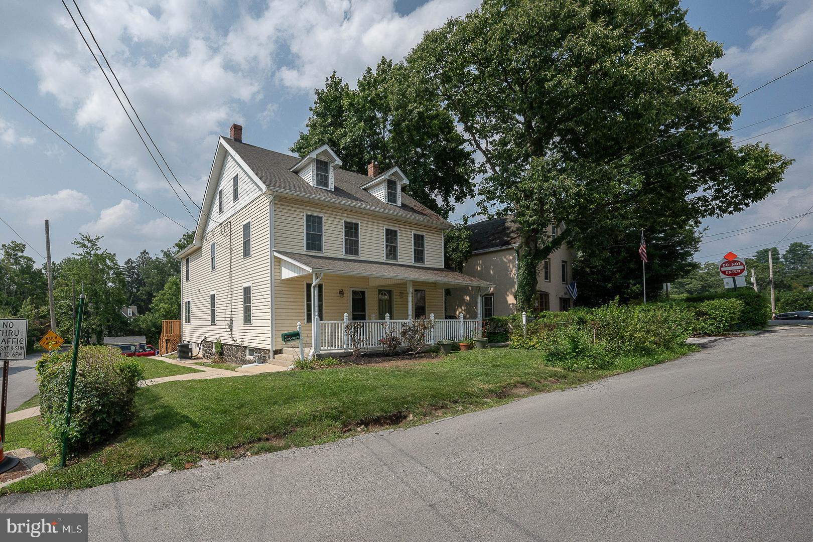 231 Plant Avenue Wayne, PA 19087 - Photo 25 of 35 a front view of a house with a yard