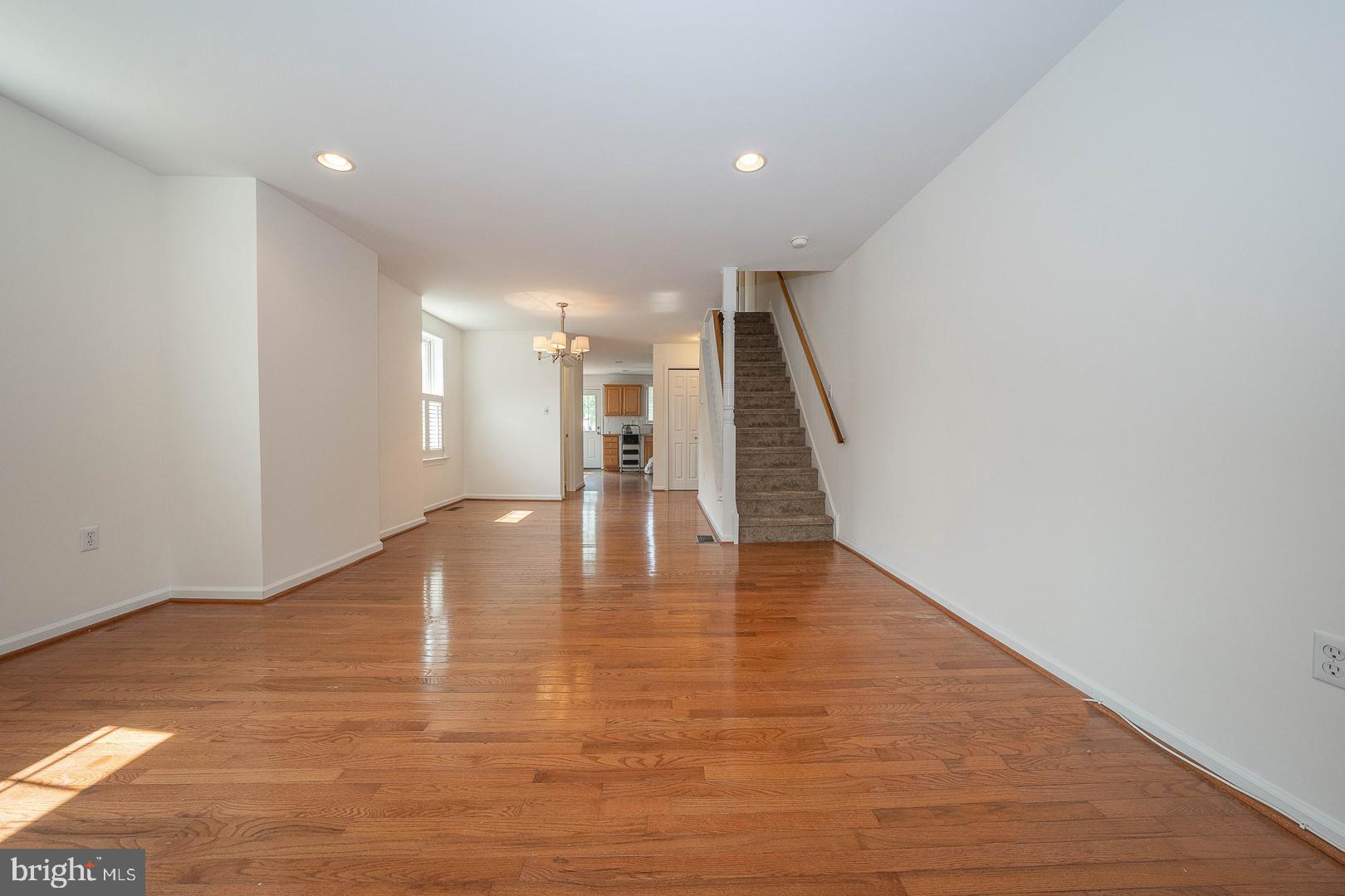231 Plant Avenue Wayne, PA 19087 - Photo 3 of 35 a view of an empty room with wooden floor