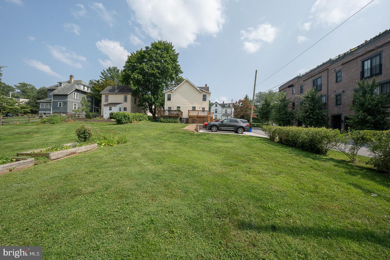 231 Plant Avenue Wayne, PA 19087 - Photo 34 of 35 a view of a house with a big yard and large trees