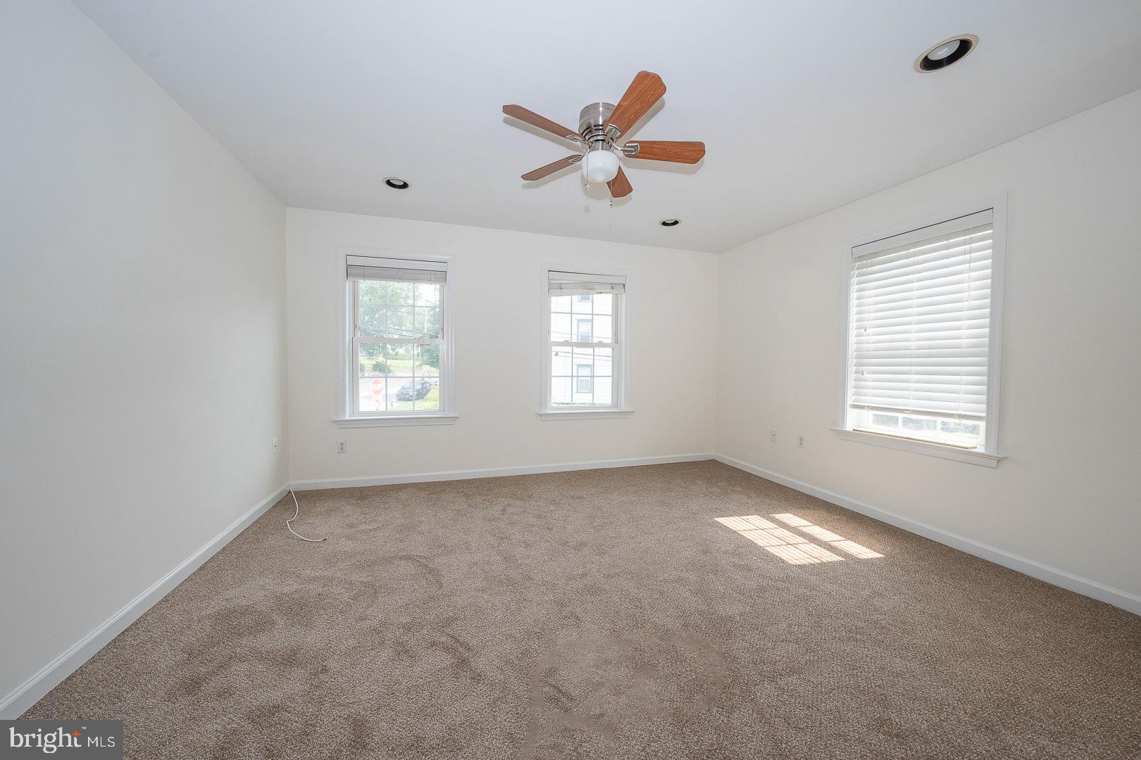 231 Plant Avenue Wayne, PA 19087 - Photo 10 of 35 a view of an empty room with a window