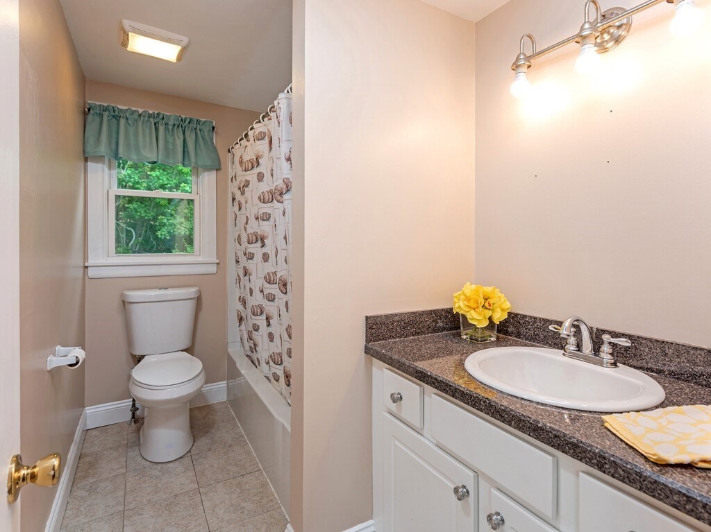 10 Hamilton Drive Holland, MA 01521 - Photo 13 of 40 a bathroom with a granite countertop sink toilet and a mirror