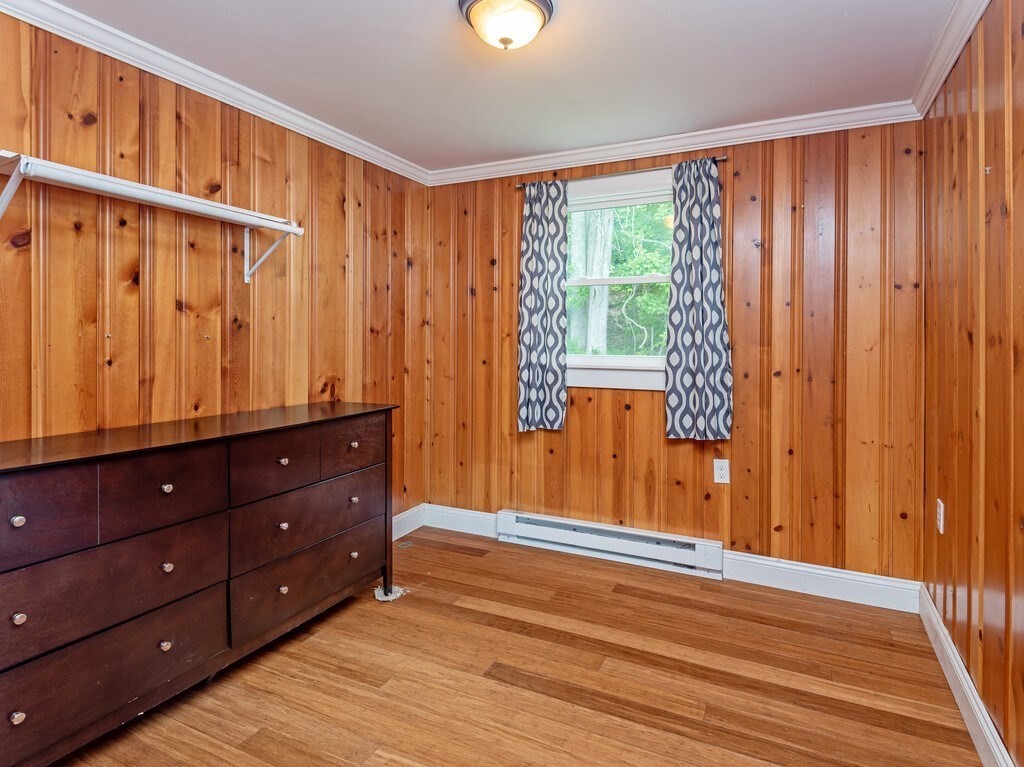 10 Hamilton Drive Holland, MA 01521 - Photo 14 of 40 a view of a closet with wooden floor