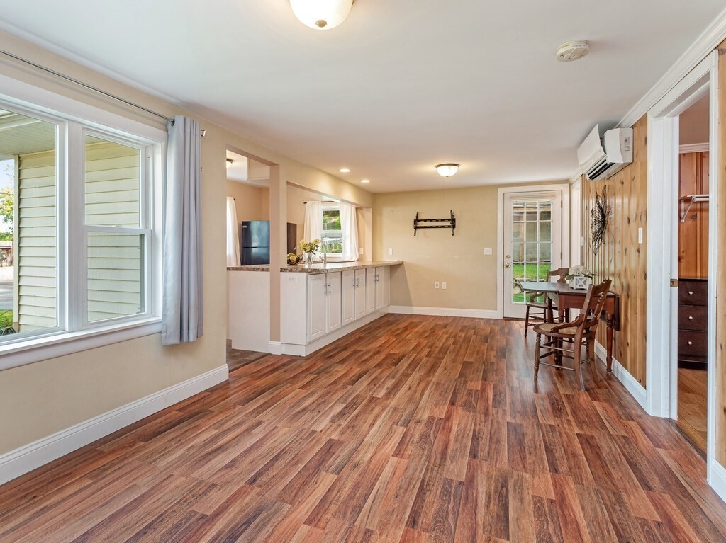 10 Hamilton Drive Holland, MA 01521 - Photo 16 of 40 a view of a living room filled with furniture and wooden floor