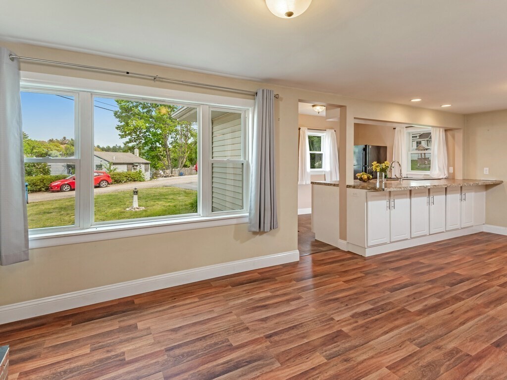 10 Hamilton Drive Holland, MA 01521 - Photo 17 of 40 a view of a kitchen with wooden floor and a window