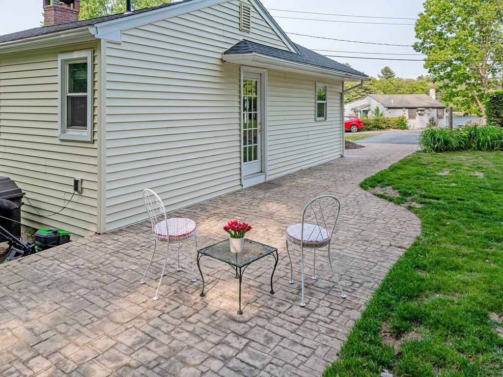 10 Hamilton Drive Holland, MA 01521 - Photo 22 of 40 a backyard of a house with seating space