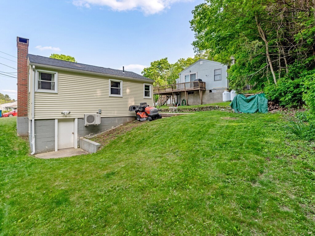 10 Hamilton Drive Holland, MA 01521 - Photo 25 of 40 a front view of a house with garden