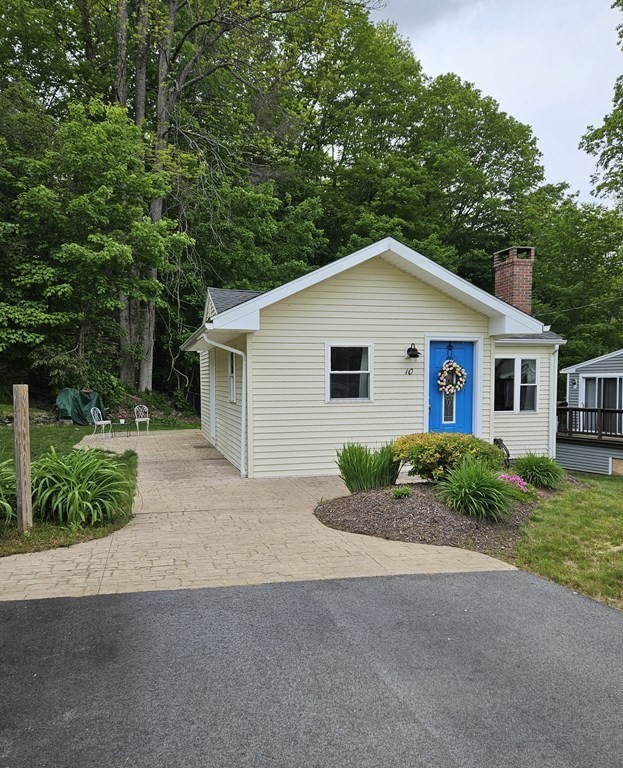 10 Hamilton Drive Holland, MA 01521 - Photo 38 of 40 a front view of house with yard and green space