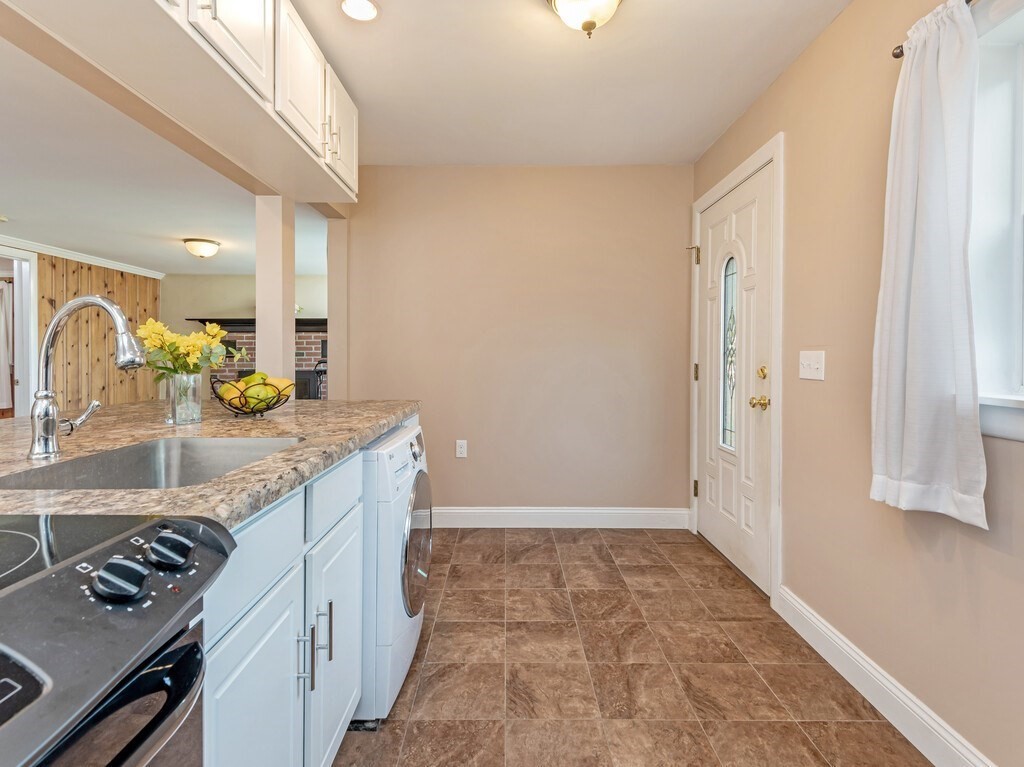 10 Hamilton Drive Holland, MA 01521 - Photo 5 of 40 a bathroom with granite countertop a sink and a mirror