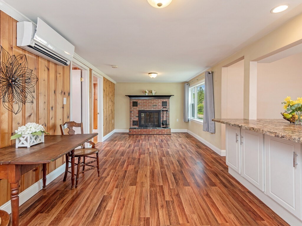 10 Hamilton Drive Holland, MA 01521 - Photo 10 of 40 a furnished livingroom with windows and wooden floor