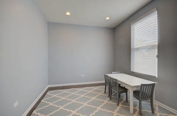 a workspace with furniture and window