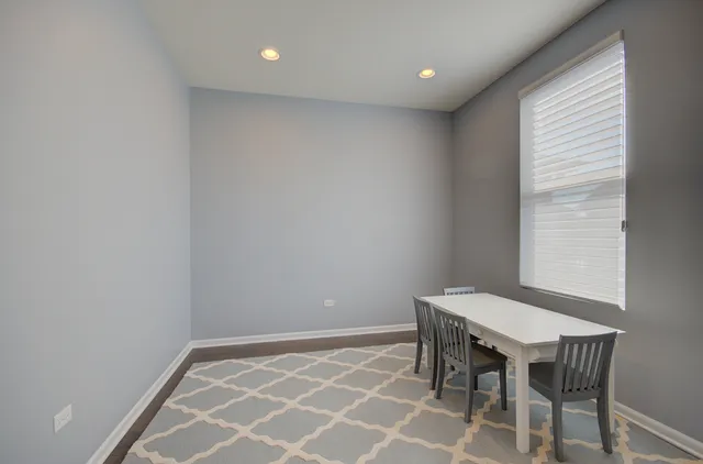 a workspace with furniture and window