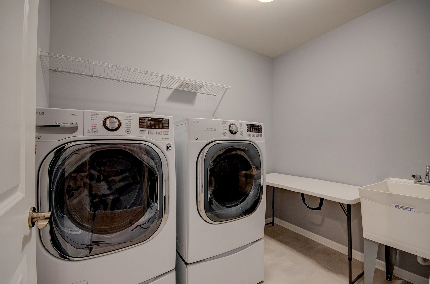 15728 Brook Shore Drive Plainfield, IL 60544 - Photo 31 of 36 a utility room with dryer and washer