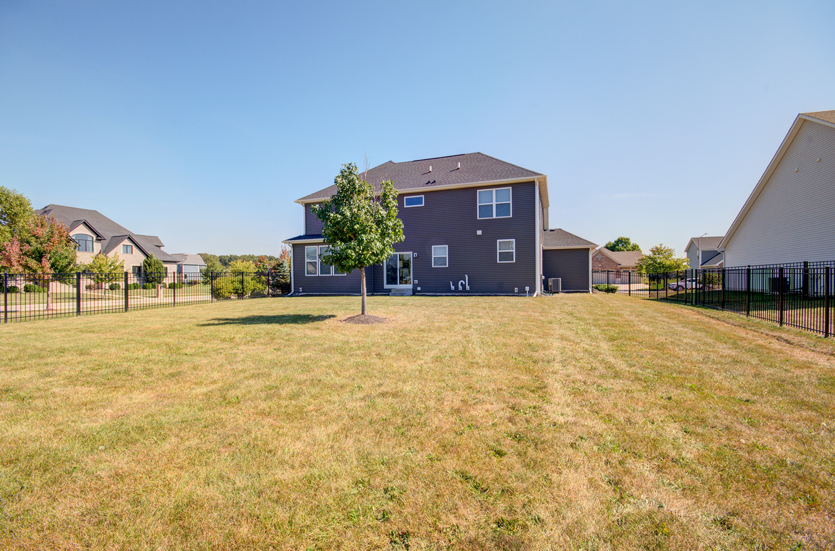 15728 Brook Shore Drive Plainfield, IL 60544 - Photo 36 of 36 a view of a house with a yard