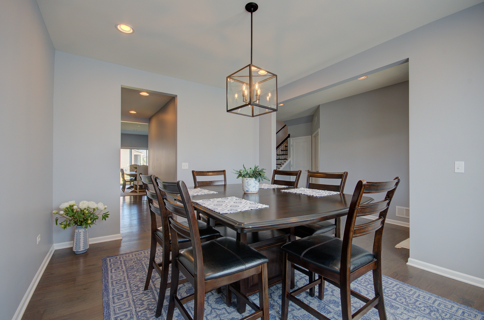 15728 Brook Shore Drive Plainfield, IL 60544 - Photo 5 of 36 a view of a dining room with a table and chairs
