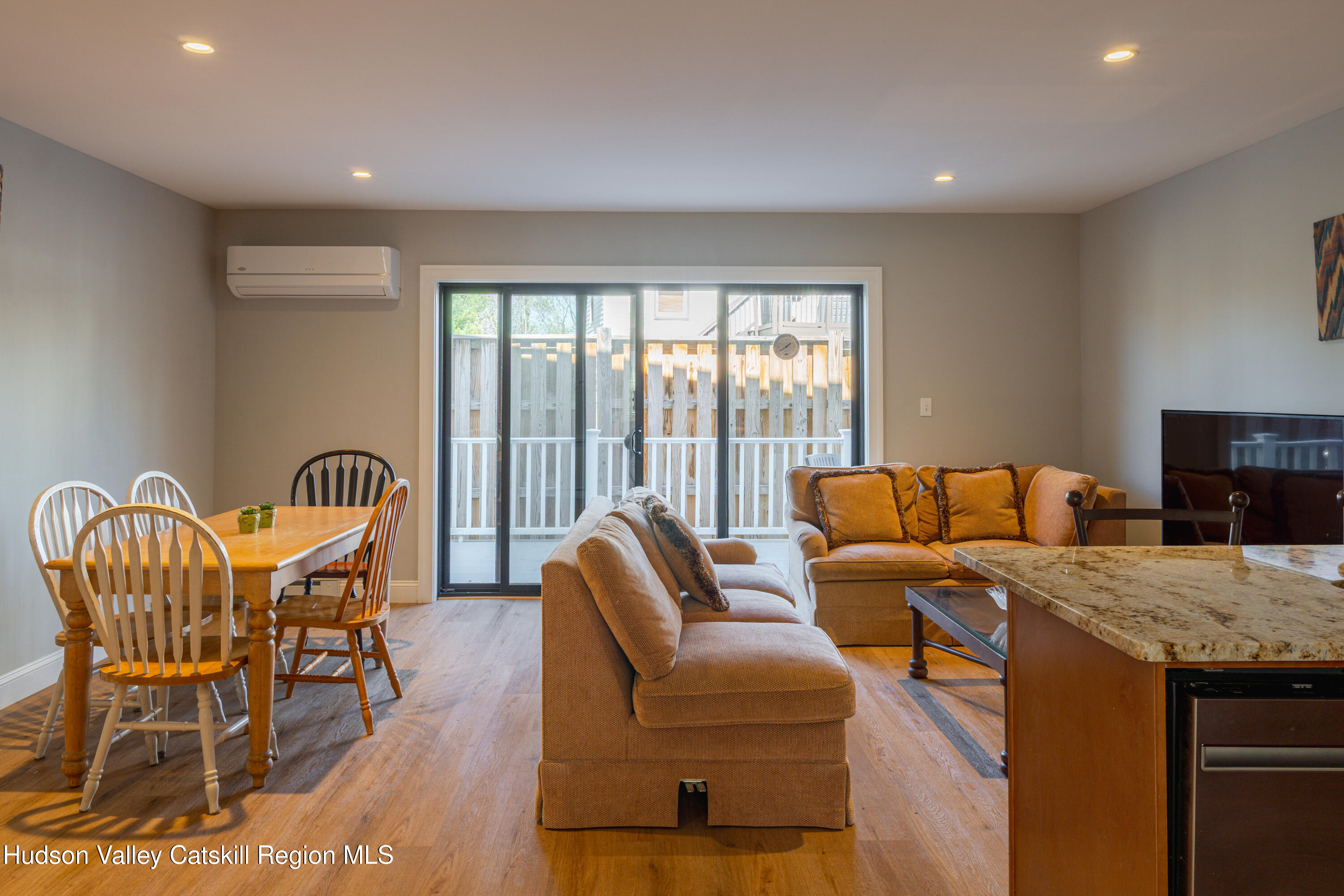 71 County Road 65, Unit 4 Windham, NY 12439 - Photo 9 of 33 a living room with furniture and a floor to ceiling window
