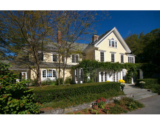 55 Sandy Pond Road Lincoln, MA 01773 - Photo 13 of 14 a front view of a house with a yard