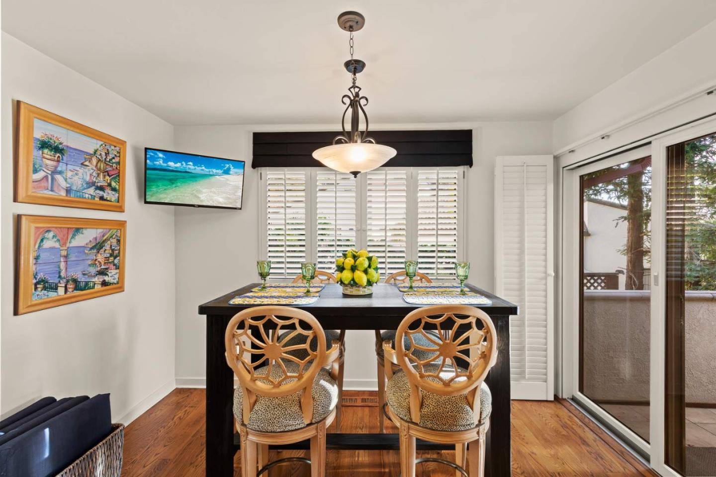 3041 Strawberry Hill Road Pebble Beach, CA 93953 - Photo 12 of 31 a dining room with furniture and window