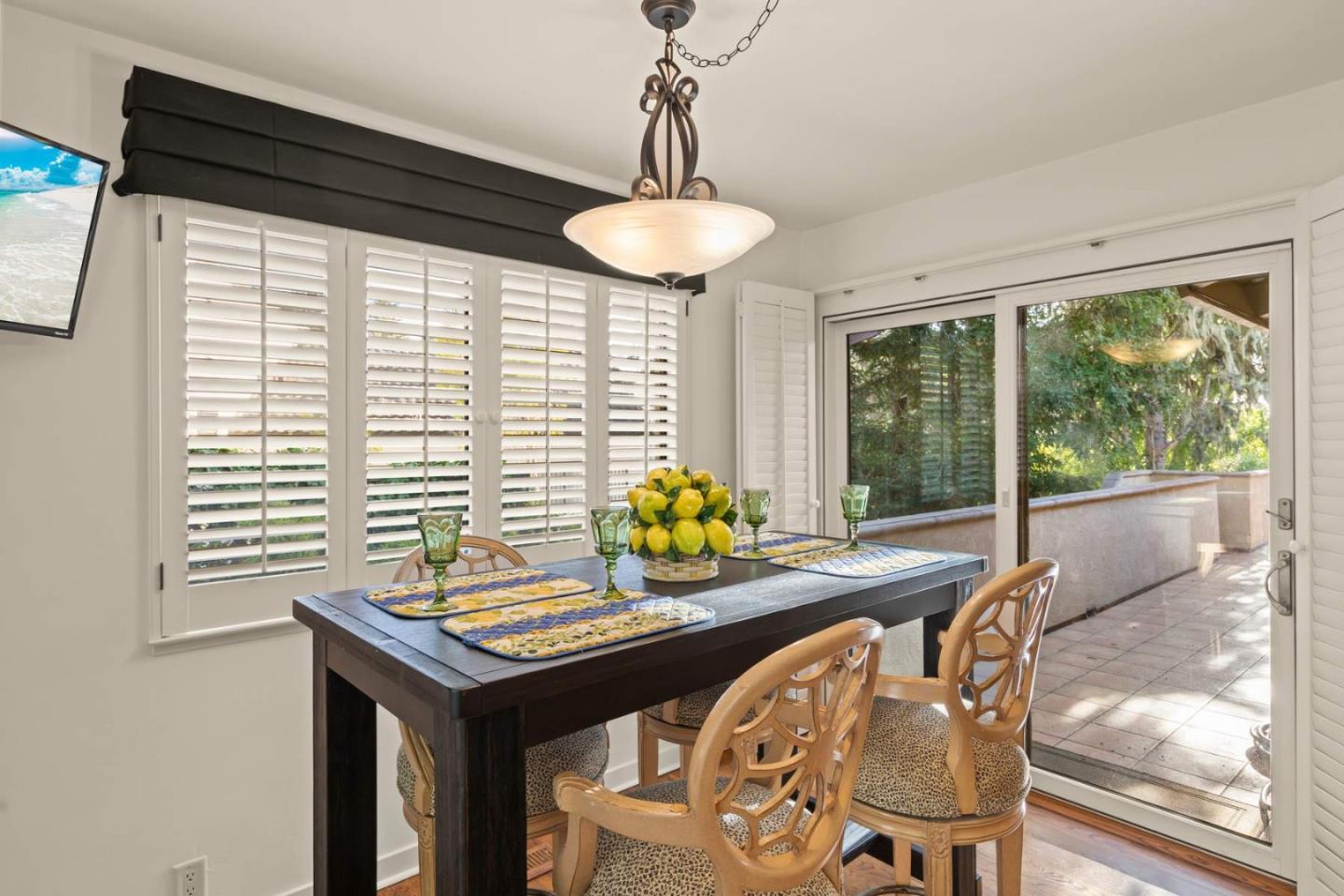 3041 Strawberry Hill Road Pebble Beach, CA 93953 - Photo 13 of 31 a view of a dining room with furniture window and outside view