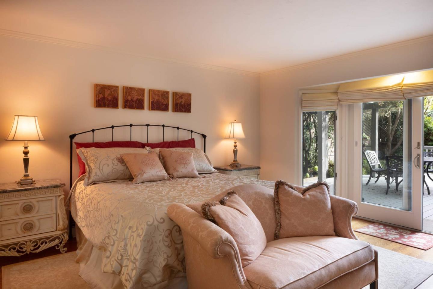 3041 Strawberry Hill Road Pebble Beach, CA 93953 - Photo 17 of 31 a bedroom with a bed and window