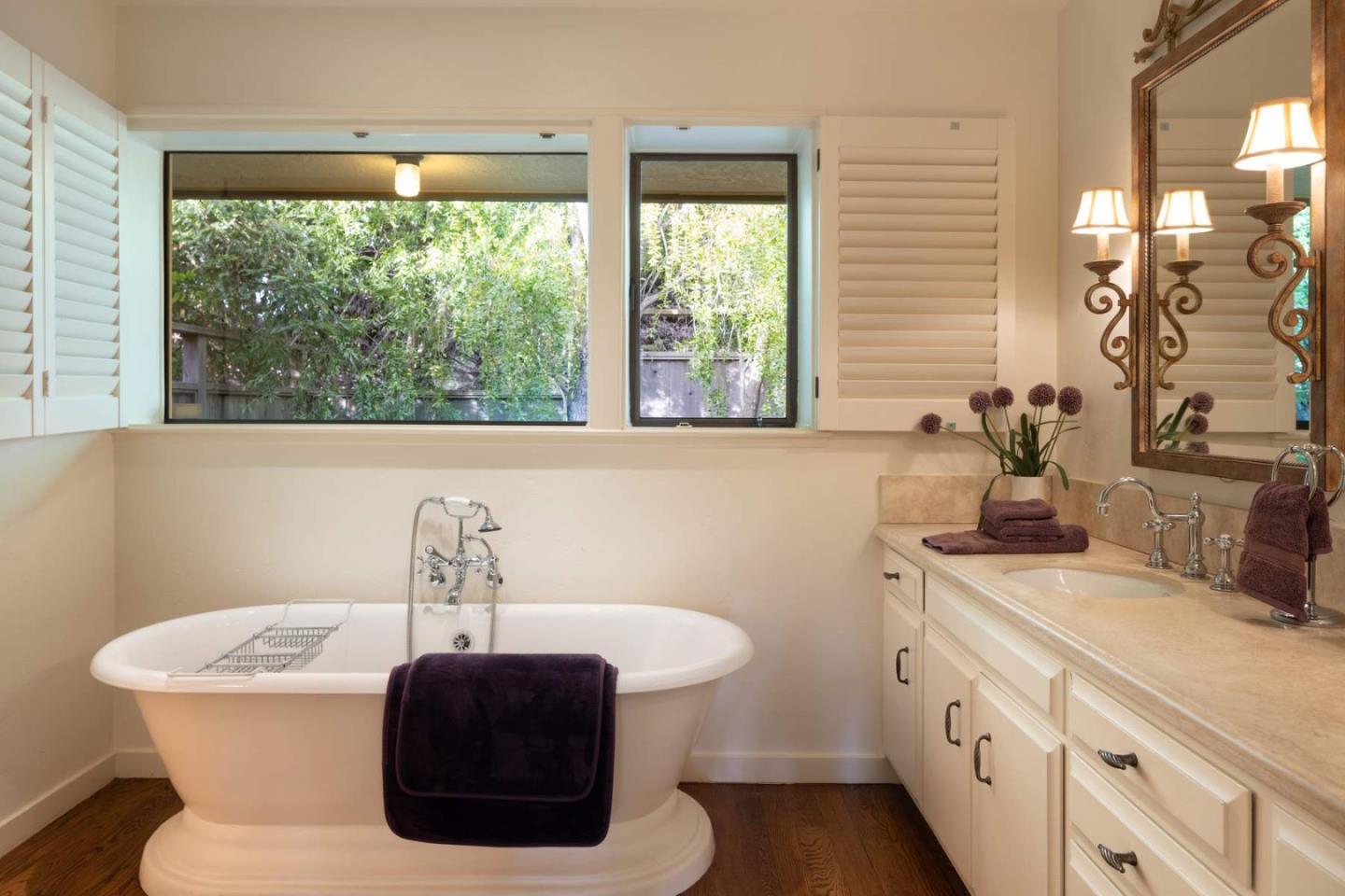 3041 Strawberry Hill Road Pebble Beach, CA 93953 - Photo 19 of 31 a bathroom with a sink and a window