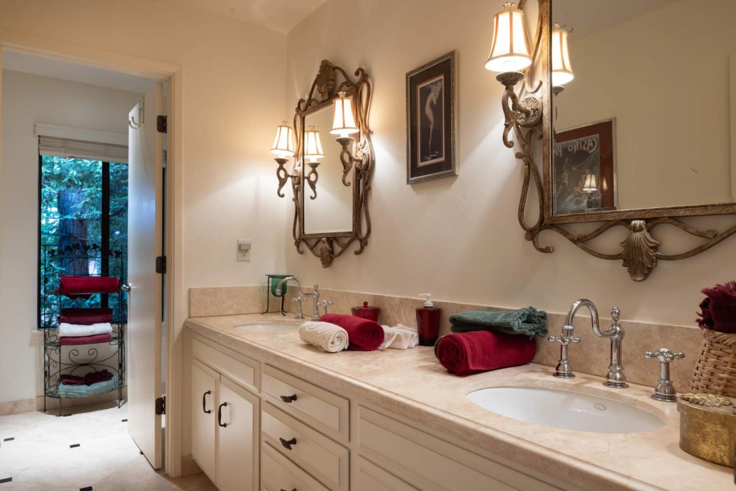 3041 Strawberry Hill Road Pebble Beach, CA 93953 - Photo 20 of 31 a bathroom with a sink and a mirror