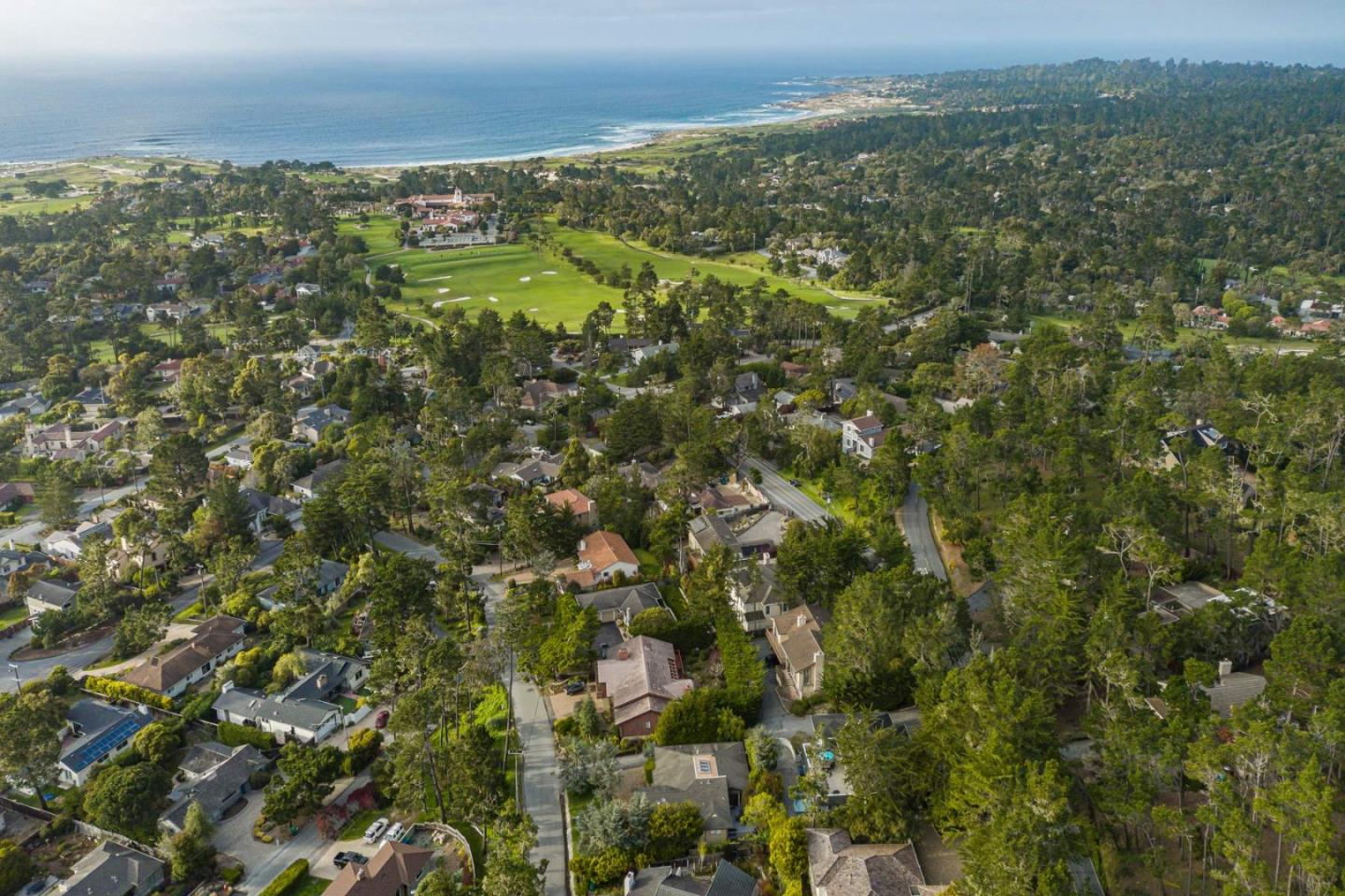 3041 Strawberry Hill Road Pebble Beach, CA 93953 - Photo 30 of 31 an aerial view of residential houses with outdoor space and trees