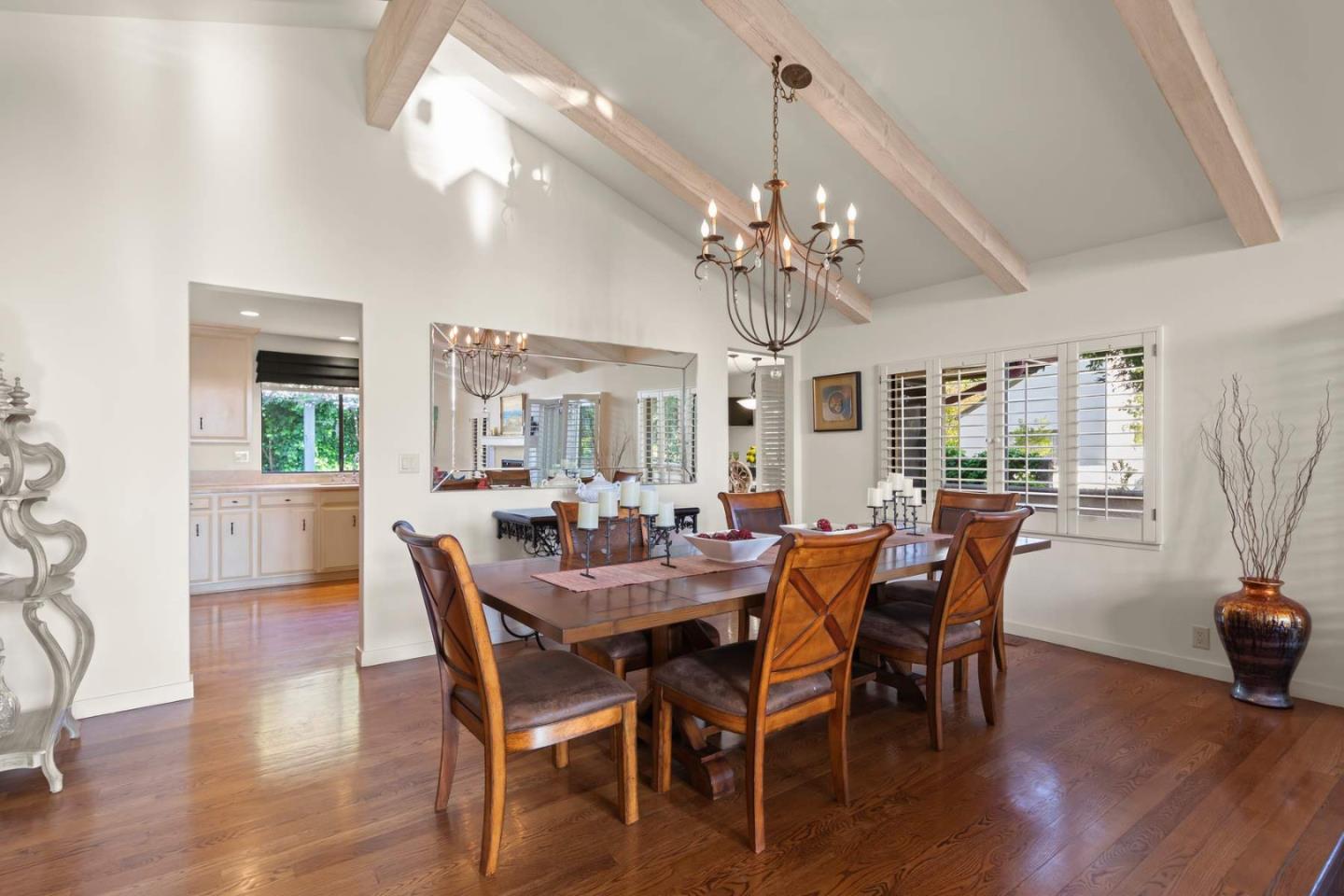 3041 Strawberry Hill Road Pebble Beach, CA 93953 - Photo 6 of 31 a view of a dining room with furniture window and wooden floor
